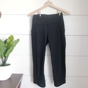 Lululemon black Capri with mesh detail and pockets